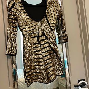 Sequenced romper, black and gold, worn once, mint condition, size XSmall/Small